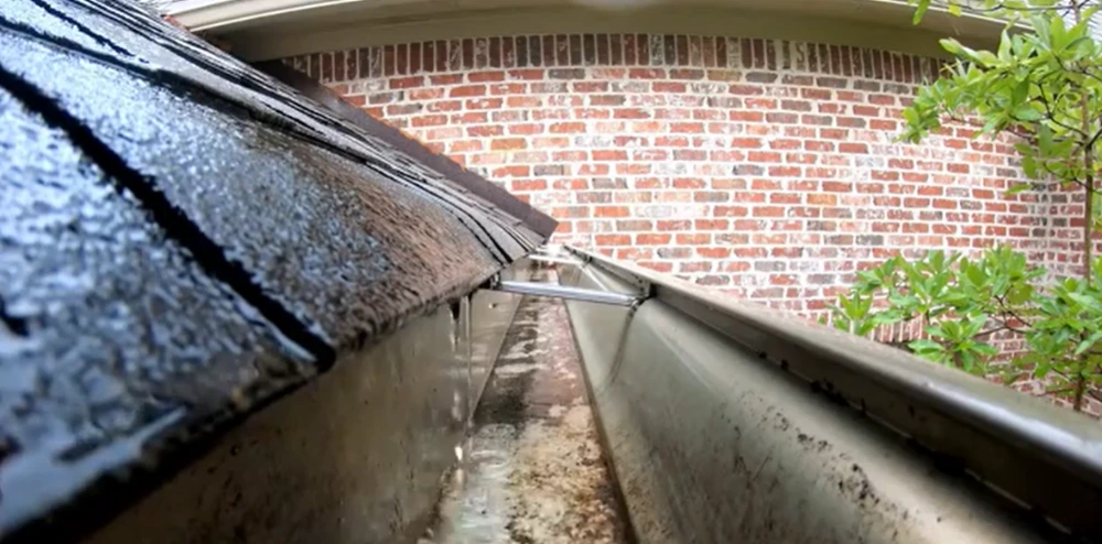 Gutter cleaning service in Roseville CA — clogged gutters being cleared before winter rain season